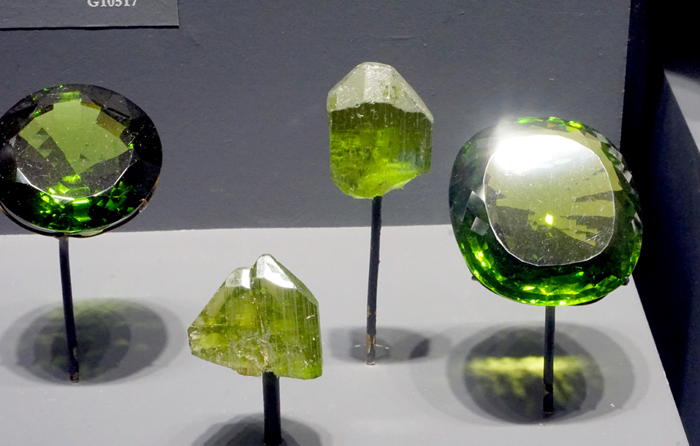 Forsterite (Olivine) var. Peridot, Crystals and Cut Gemstones From Zabargad Island, Red Sea, Egypt