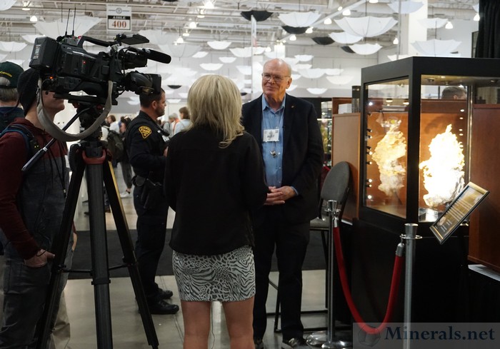 Peter Megaw, Exhibits Chair for the Show, Showcasing the Large Gold Specimen to the Media